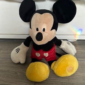 Vintage Mickey Mouse stuffed animal. Well loved. 17” top of head to bottom of ft